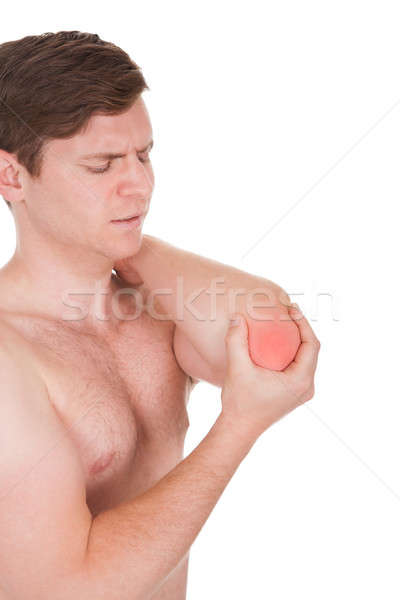 Man With Pain In Elbow Stock photo © AndreyPopov