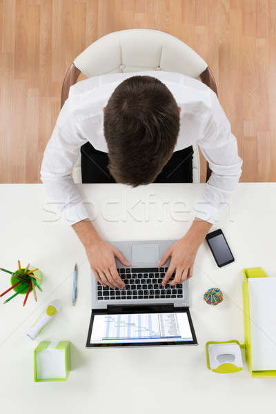Businessman Working On Laptop Showing Gantt Chart Stock photo © AndreyPopov