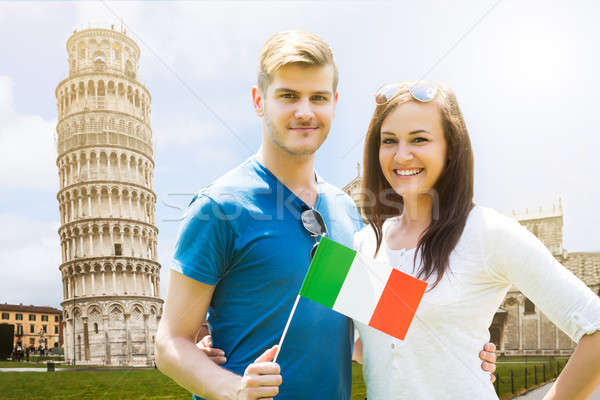 Sonriendo Pareja bandera italiana torre Foto stock © AndreyPopov