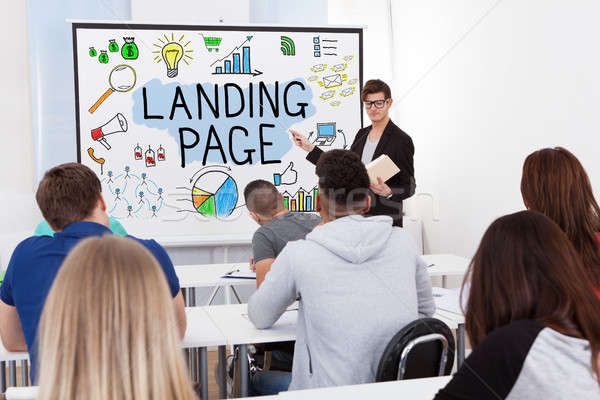 Male Teacher Teaching Landing Page To Students Stock photo © AndreyPopov