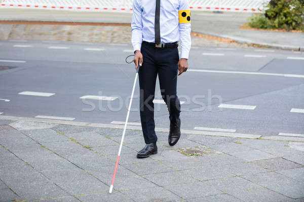 Blind Person Walking On Street Stock photo © AndreyPopov