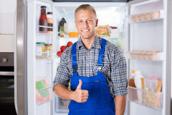 Portrait Of A Repairman Gesturing Thumbs Up Stock photo © AndreyPopov