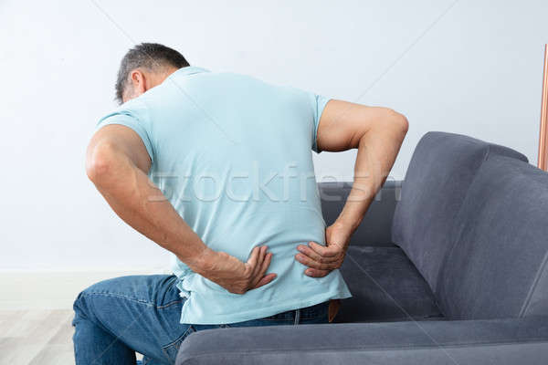 Mature Man Suffering From Back Pain Stock photo © AndreyPopov