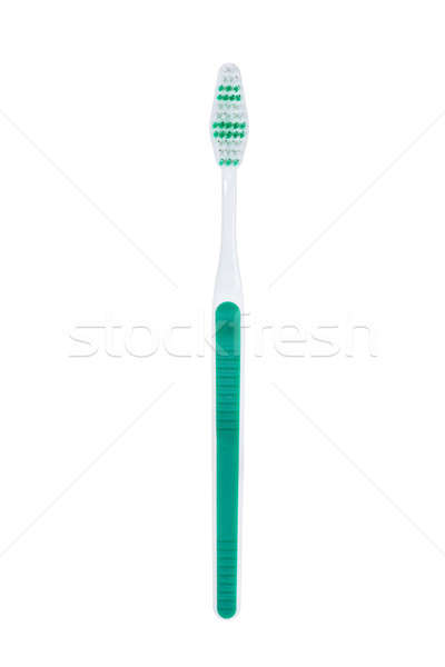 Plastic toothbrush with turquoise trim Stock photo © AndreyPopov