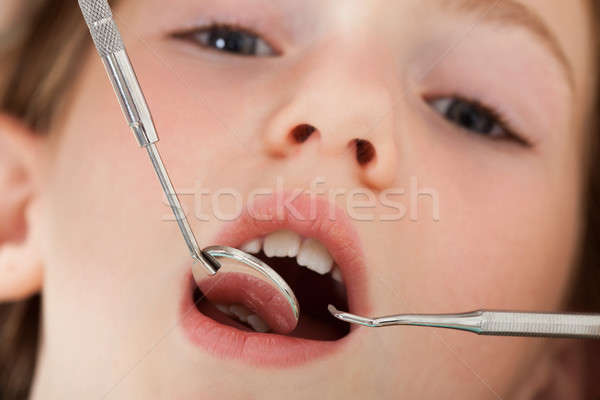Girl Going Through Dental Examination Stock photo © AndreyPopov
