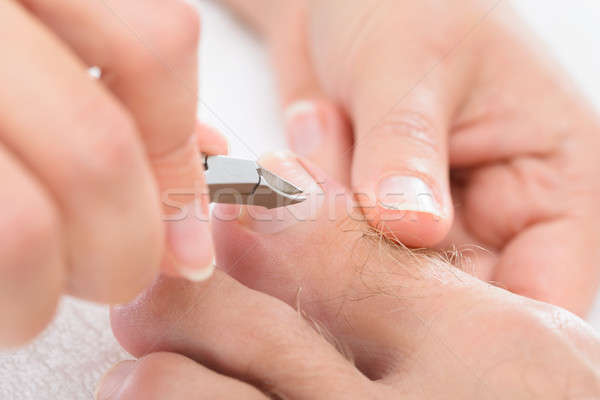 Stock photo: Beautician Trimming Cuticles