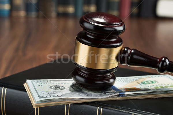 Stock photo: Gavel With American Banknote And Book