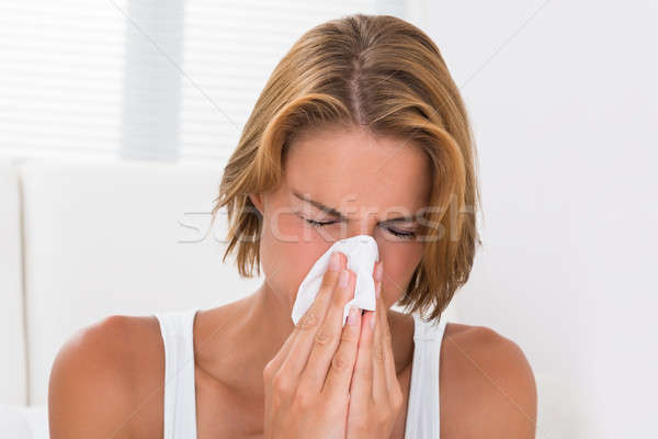 Donna soffia il naso tessuto carta ritratto Foto d'archivio © AndreyPopov