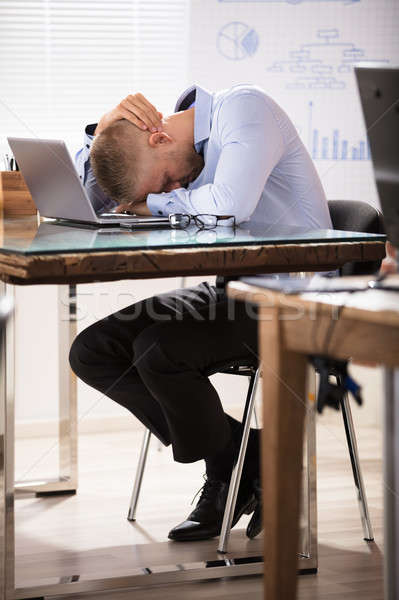 Businessman Sleeping Over The Desk Stock photo © AndreyPopov