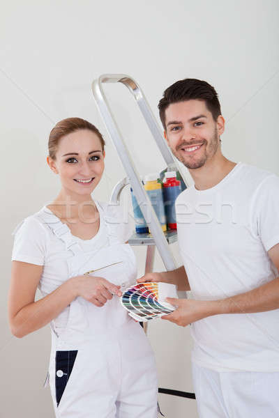 Stock photo: Young Couple With Color Samples