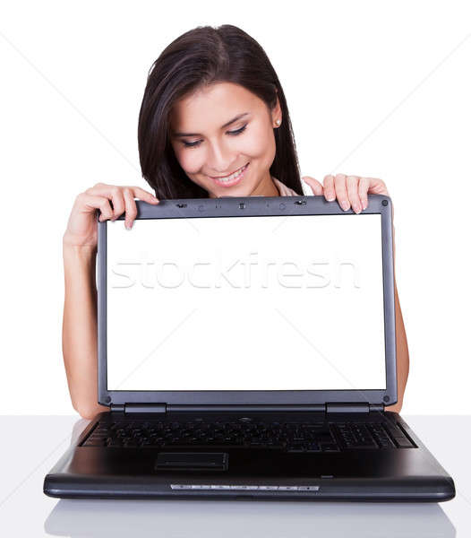 Glimlachende vrouw laptop scherm ogen tonen permanente Stockfoto © AndreyPopov