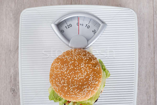 Burger On Weight Scale Stock photo © AndreyPopov