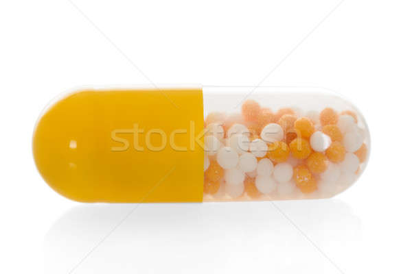 Capsule witte Geel medische pil geïsoleerd Stockfoto © AndreyPopov