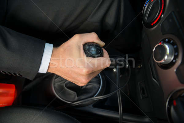 Close-up A Hand Holding Gear Stick Stock photo © AndreyPopov