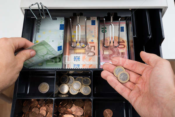 Persona mani soldi registratore di cassa primo piano metal Foto d'archivio © AndreyPopov