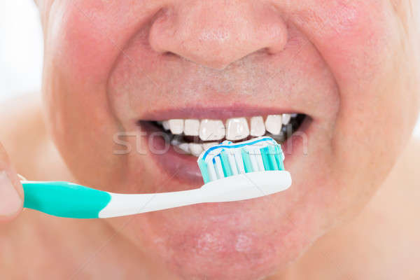 Man Brushing His Teeth Stock photo © AndreyPopov