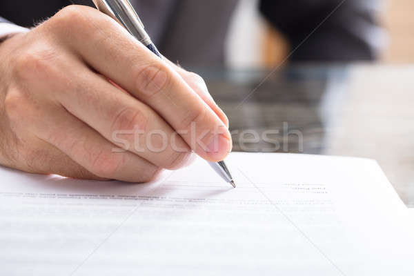 Unterzeichnung Dokument Hand Schreibtisch Stock foto © AndreyPopov