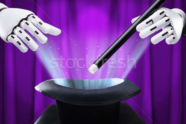 Robot Holding Magic Wand Over Illuminated Hat Stock photo © AndreyPopov