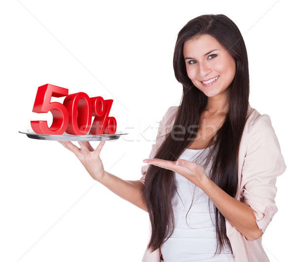 Woman presenting 50% discount on silver platter Stock photo © AndreyPopov