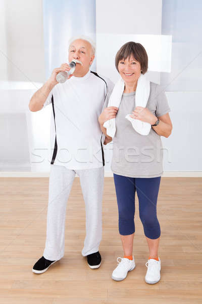 Senior Couple Taking Break After Workout At Gym Stock photo © AndreyPopov