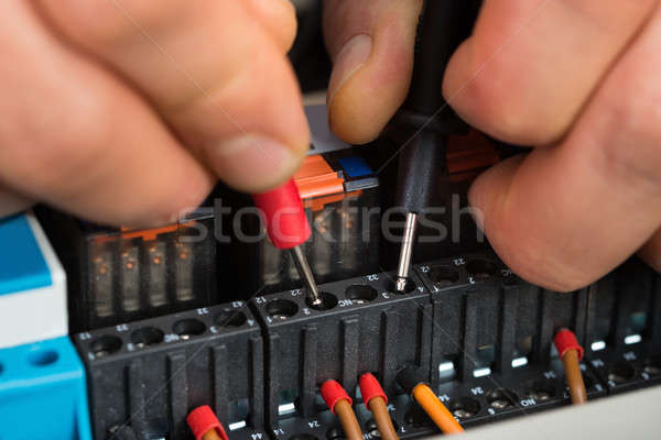 Electrician Checking Fuse Stock photo © AndreyPopov