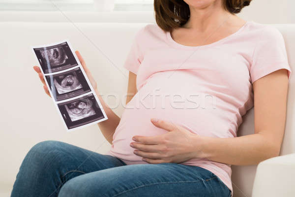 Közelkép terhes nő tart ultrahang kép baba Stock fotó © AndreyPopov