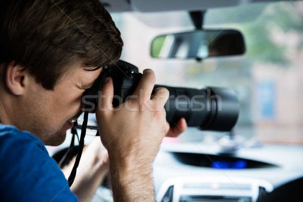 Man Photographing With SLR Camera Stock photo © AndreyPopov