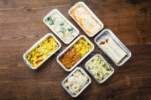 Stock photo: Tasty Meals In Foil Containers On The Table