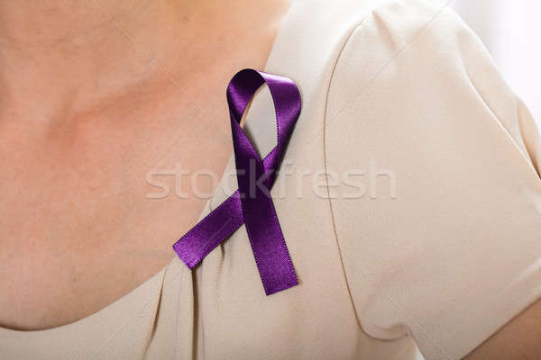 Woman With Violet Ribbon To Support Breast Cancer Cause Stock photo © AndreyPopov