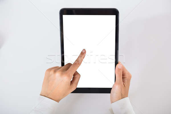Homme d'affaires numérique comprimé blanche écran Photo stock © AndreyPopov