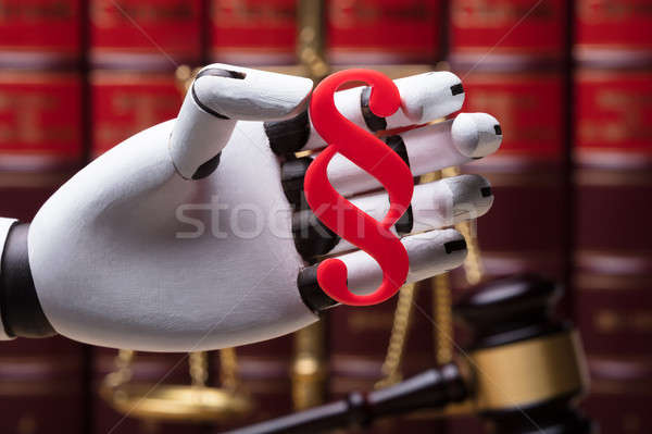 Robot Holding Paragraph Symbol Stock photo © AndreyPopov