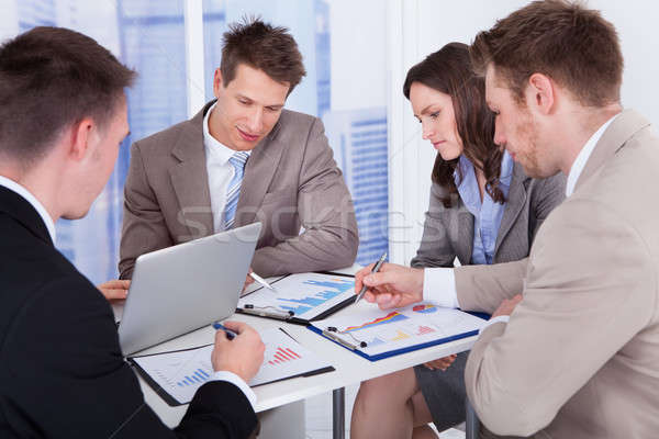 Business People Discussing At Table In Office Stock photo © AndreyPopov