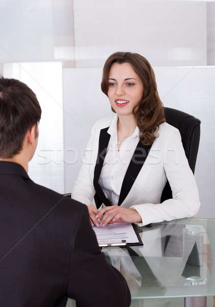 Femme d'affaires regarder candidat entrevue belle Homme [[stock_photo]] © AndreyPopov