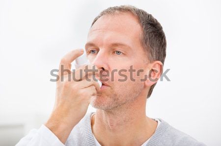 Homme asthme médicaux cheveux maison médecine [[stock_photo]] © AndreyPopov