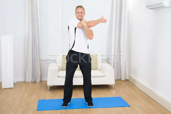 Stock photo: Happy Man Doing Exercise