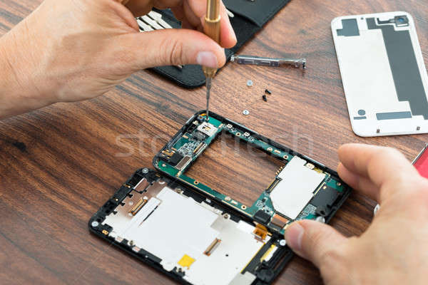 Technician Hand Repairing Cellphone Stock photo © AndreyPopov