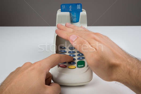 Person Hand Entering Code In A Card Reader Stock photo © AndreyPopov