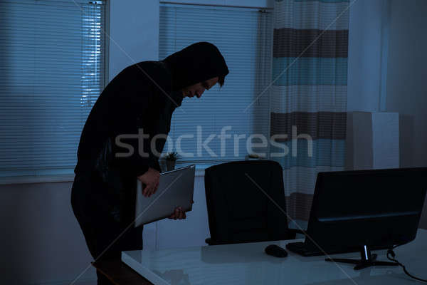 Thief Stealing Laptop Stock photo © AndreyPopov