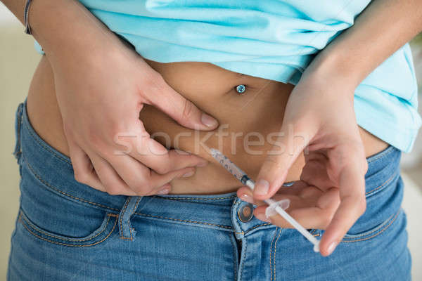 Imagine de stoc: Diabetic · femeie · stomac · acasă · medical