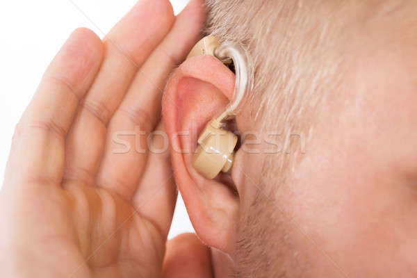 Stock foto: Mann · tragen · Hörgerät · Ohr · hören