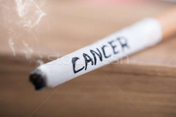 Cancer Text On Burning Cigarette Stock photo © AndreyPopov