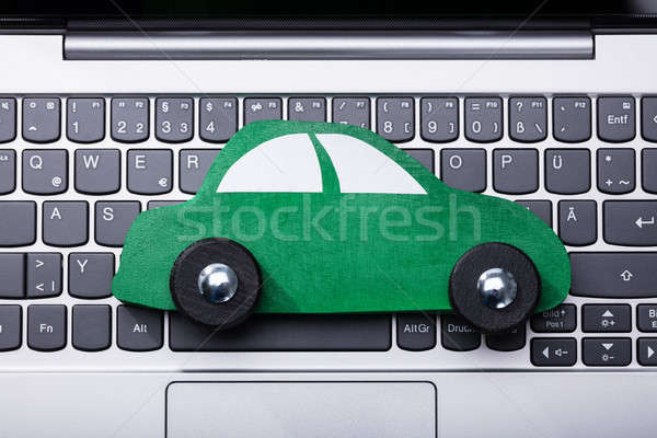 Green Car On Laptop Keypad Stock photo © AndreyPopov