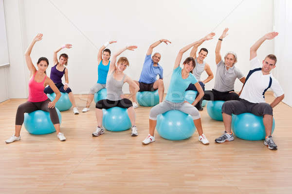 Pilates sınıf egzersiz spor salonu büyük bir grup Stok fotoğraf © AndreyPopov