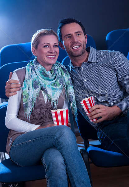 Stylish couple enjoying a movie Stock photo © AndreyPopov