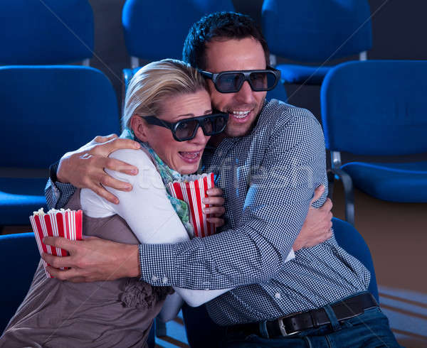 Couple reacting to a 3D movie Stock photo © AndreyPopov