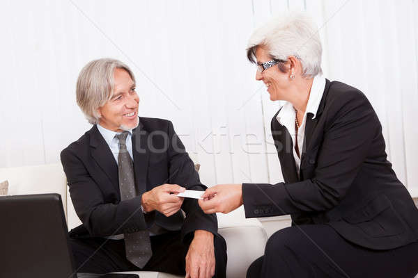 Business card being passed over Stock photo © AndreyPopov