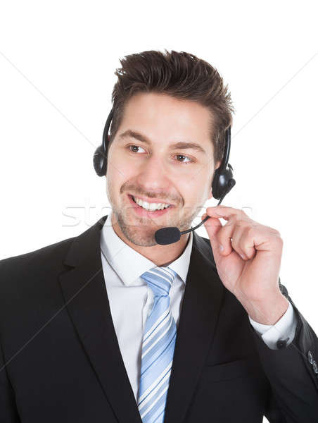 Male Call Center Representative Wearing Headset Stock photo © AndreyPopov