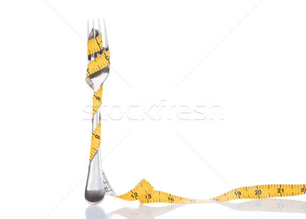 Fork Wrapped With Measure Tape Stock photo © AndreyPopov