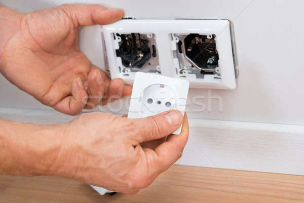 Technicien socket mur maison Photo stock © AndreyPopov