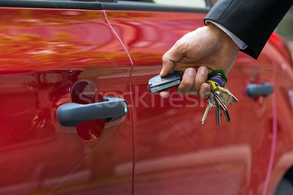 Man Opening The Car Door With Remote Control Stock photo © AndreyPopov